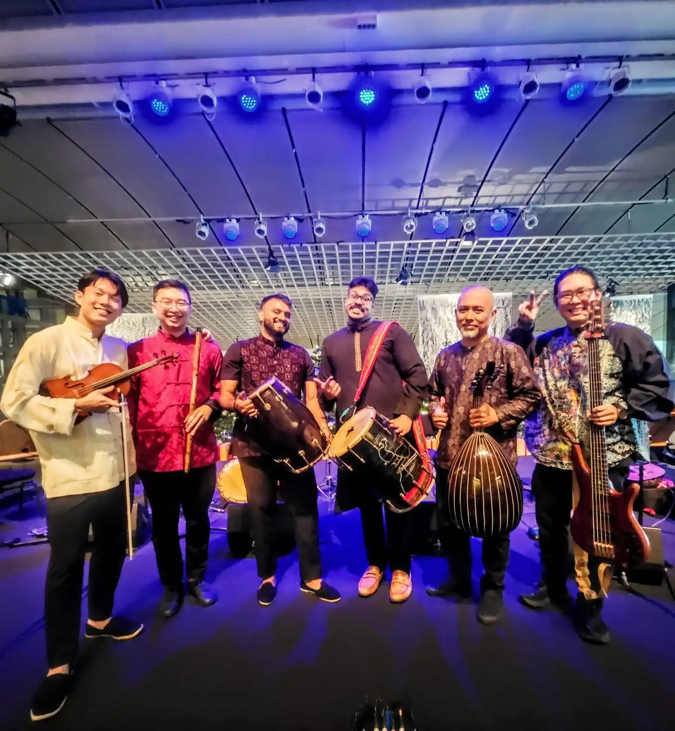 Ding Sng with members of the Straits Collective at the Esplanade Concourse, Dec 2025.
